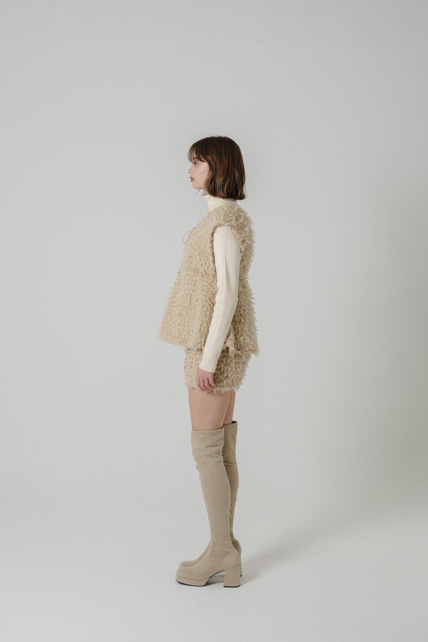 FLUFFY PEPLUM VEST Eaphi